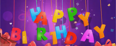 En festlig bursdagskake med ballonger og konfetti som symboliserer humor og glede